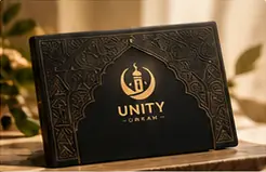 Black and gold Unity Umrah gift box for the Noor Umrah gift